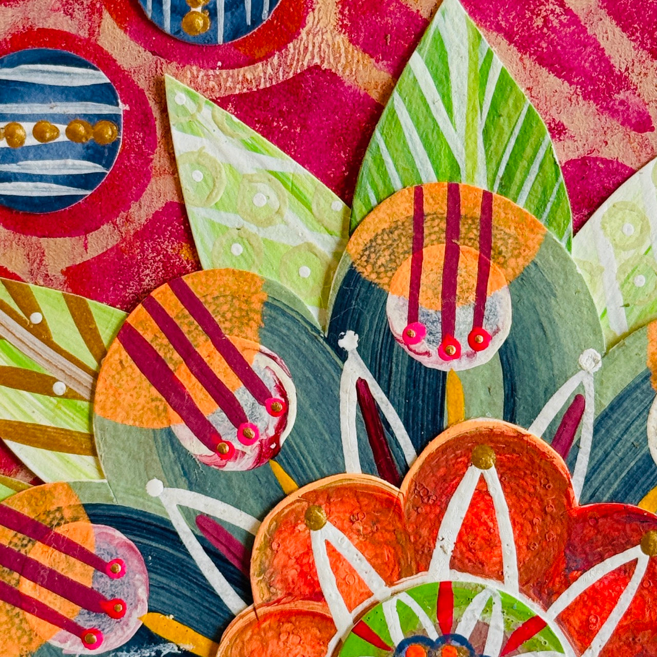 Small square wood panel art with a bold patterned floral design and hand-painted collage elements.