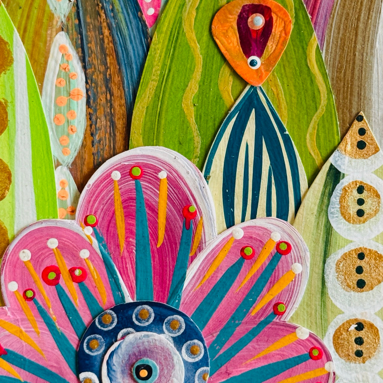 Small square wood panel art with a bold patterned floral design and hand-painted collage elements.