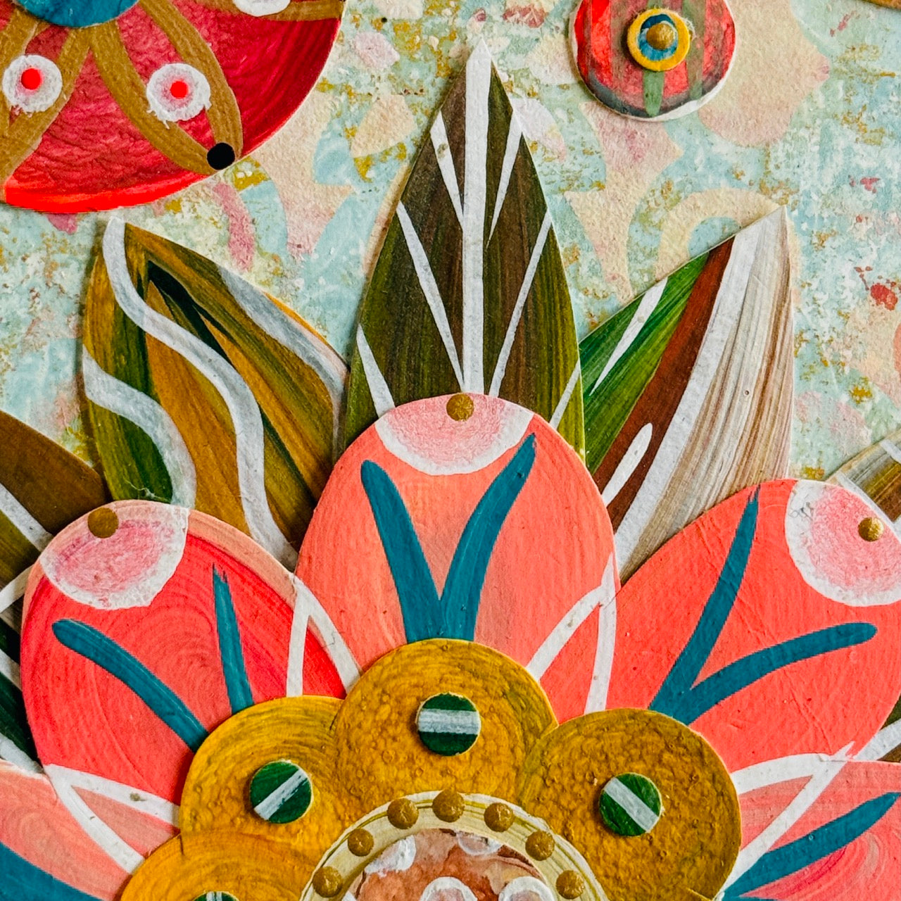 Small square wood panel art with a bold patterned floral design and hand-painted collage elements.
