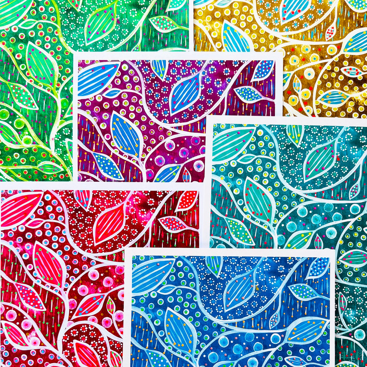 Hand-painted digital patterned paper from the Global Paper Pack Indonesia, showing six vibrant colorways with leafy patterns and dotted mark making, designed for collage, mixed media art, and paper crafting.