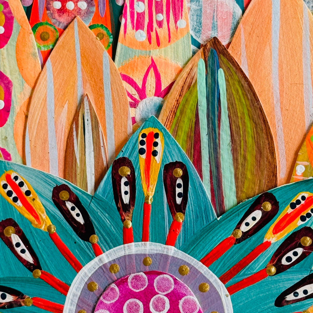 Small square wood panel art with a bold patterned floral design and hand-painted collage elements.