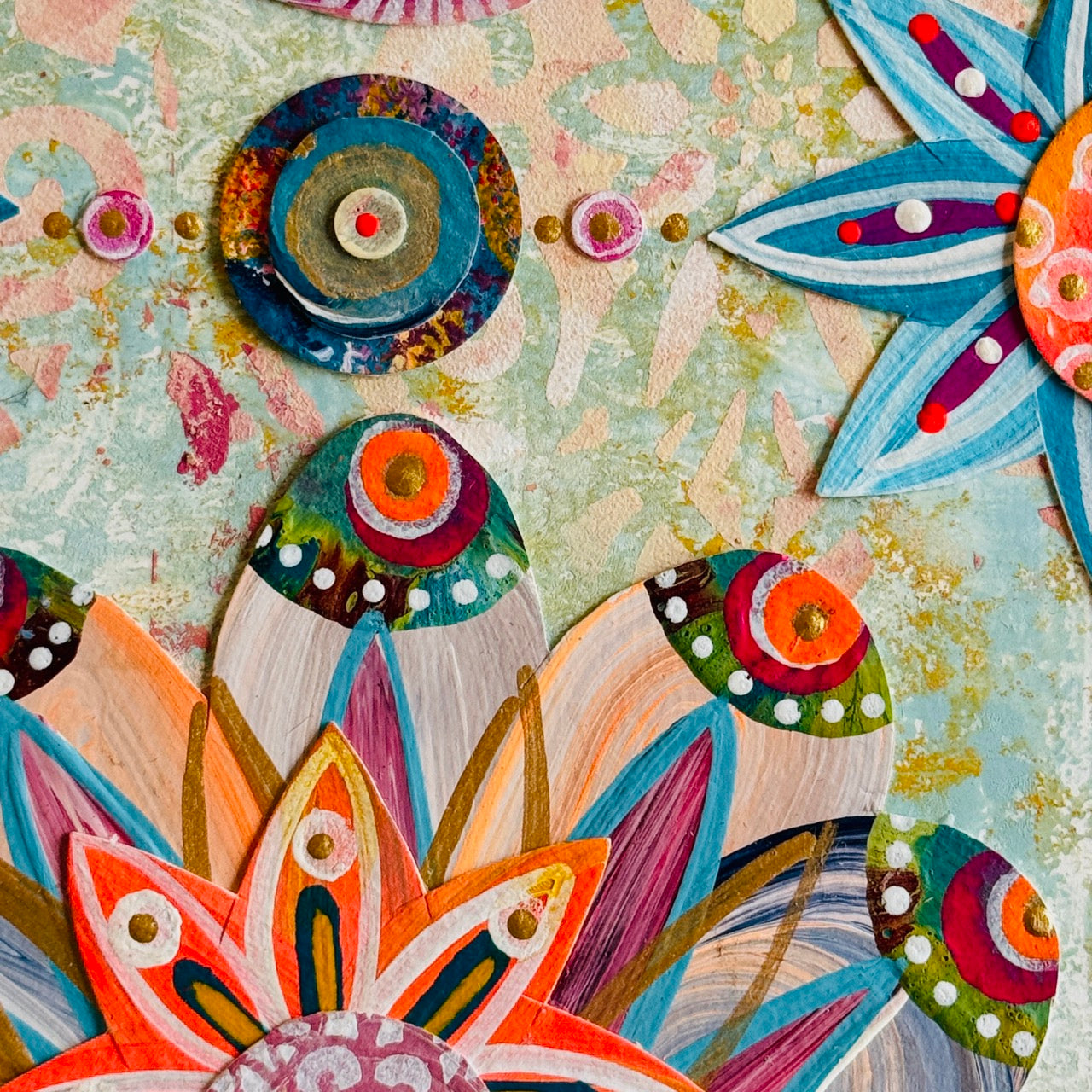 Small square wood panel art with a bold patterned floral design and hand-painted collage elements.