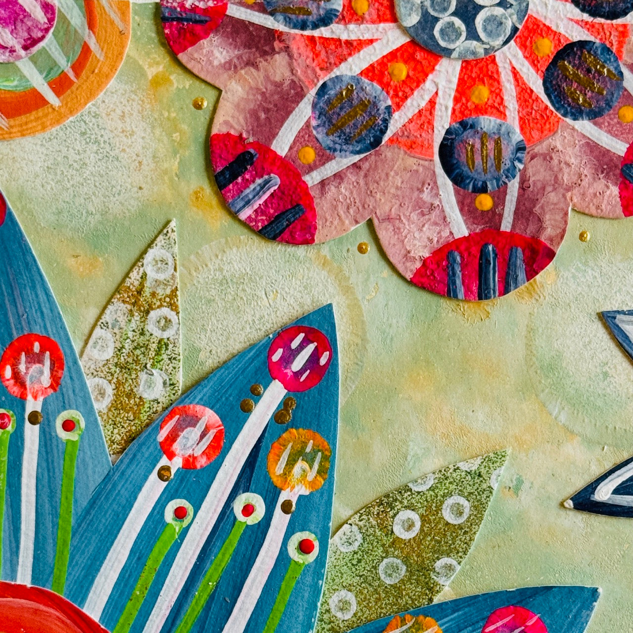 Small square wood panel art with a bold patterned floral design and hand-painted collage elements.