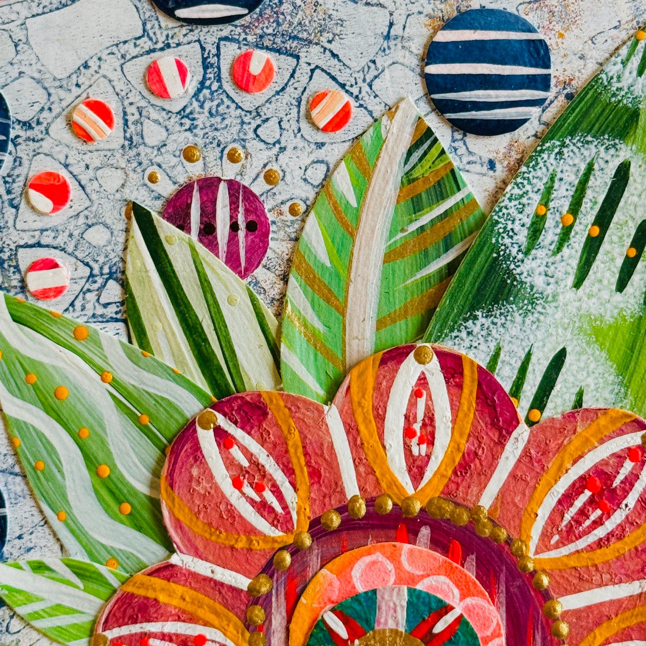 Small square wood panel art with a bold patterned floral design and hand-painted collage elements.