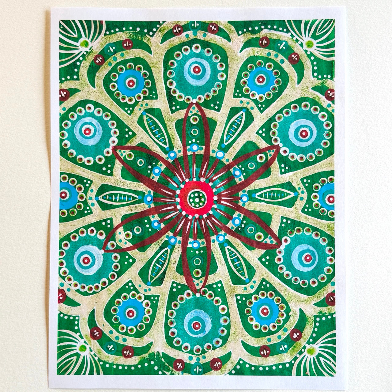 A vibrant collection of hand-painted Mexico-inspired patterned papers featuring bold floral motifs and layered geometric designs in rich greens.