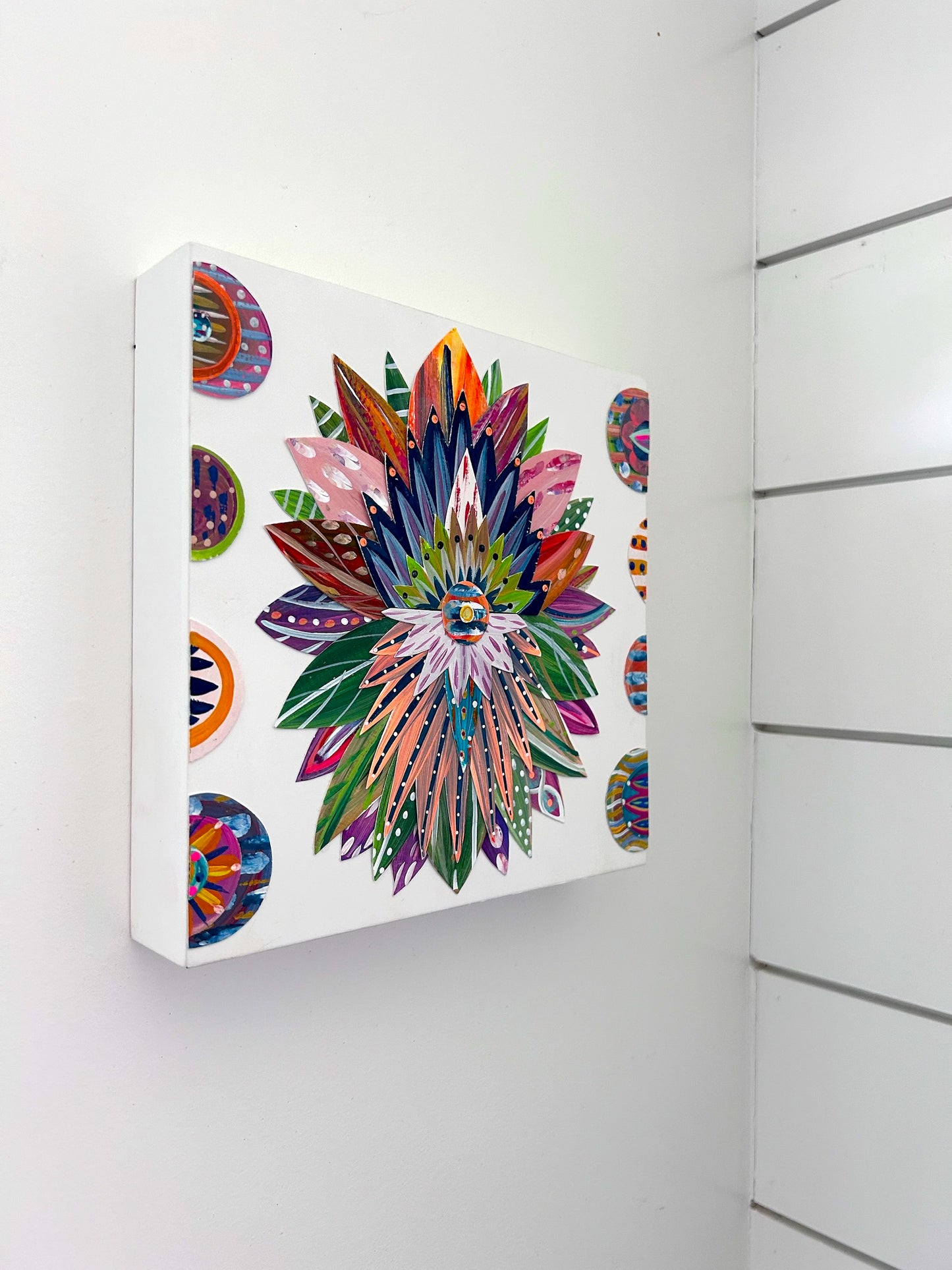 Brightly colored, hand-painted collage art for wall art. Wood block painted art that measures 8 X 8 X 1.5 inches. pop_1