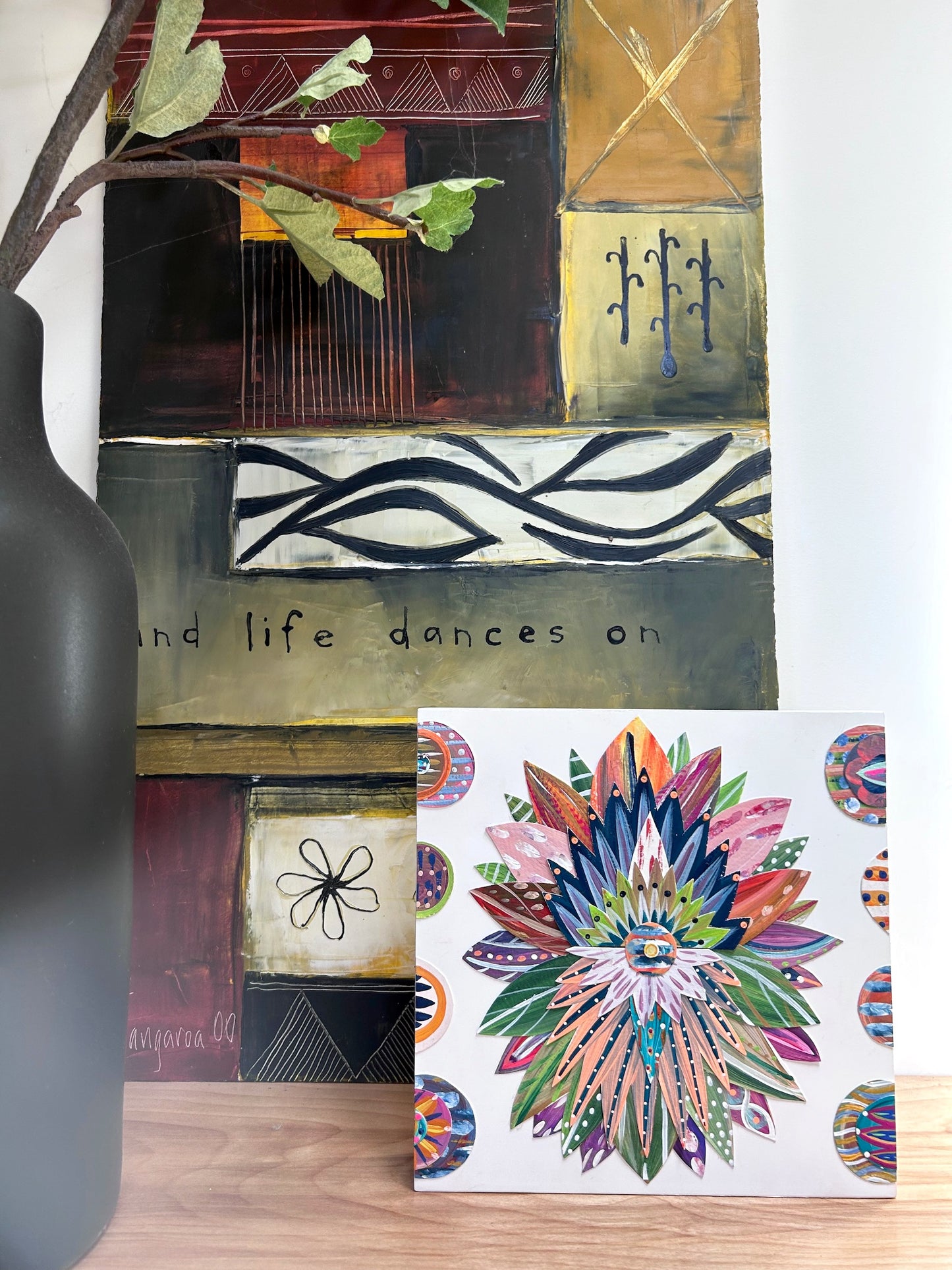 Brightly colored, hand-painted collage art for wall art. Wood block painted art that measures 8 X 8 X 1.5 inches. pop_4